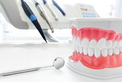 Should You Choose Dentures or Implants?